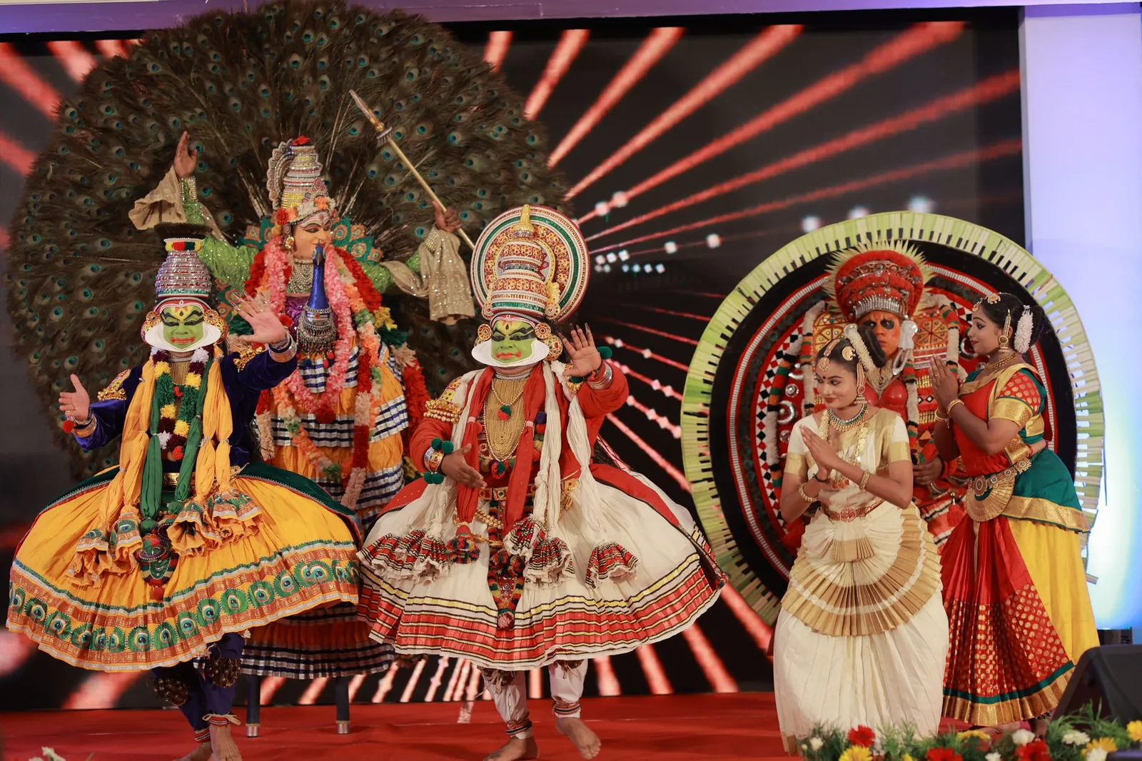A traditional Kerala cultural scene at golden light